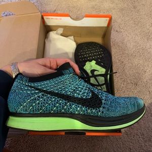 Nike flyknit racer. Blue lagoon/black prized blue. Men’s 6 women’s 7.5